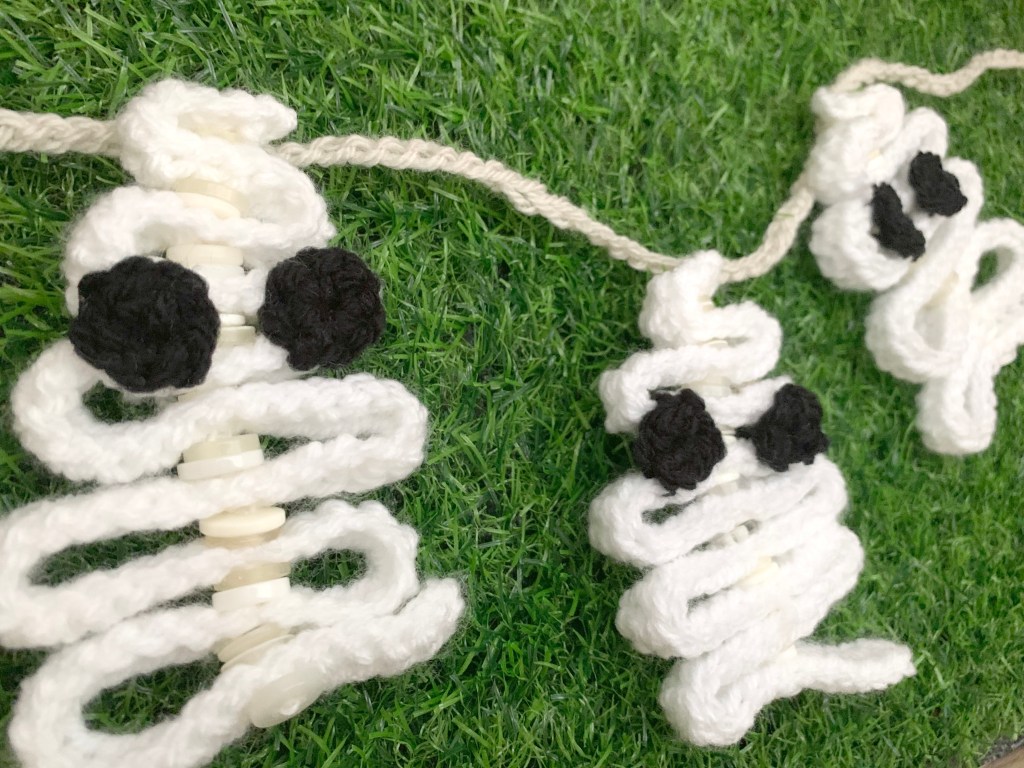 Folded Crochet Ribbon Ghost Bunting With Button&nbsp;Details